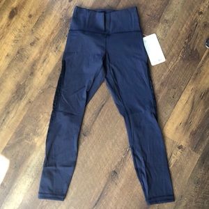 Lululemon meant to move 7/8 tight size 6 navy
